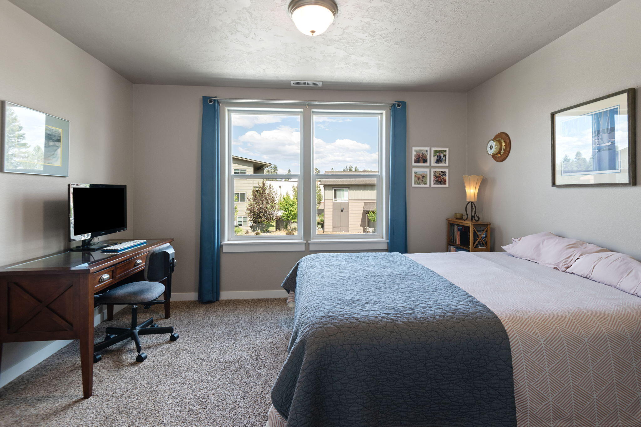 715 Brooks Camp Road Sisters, OR 97759 - Photo 18 of 25 a bedroom with a bed and a window