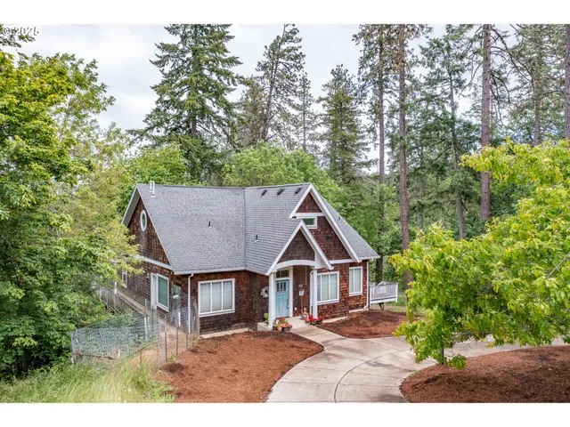 a view of house with outdoor space
