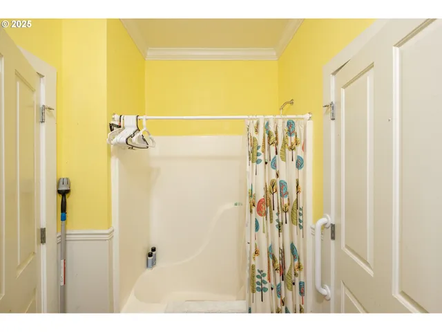 a view of a bathroom with a shower