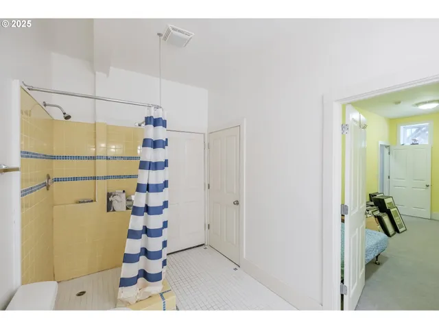 a dining room with a table and chairs