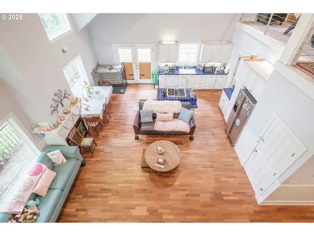 a living room with furniture and a table