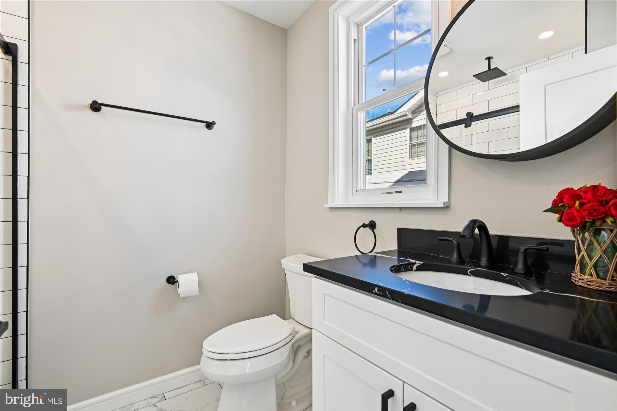 233 Farragut Road Annapolis, MD 21401 - Photo 12 of 38 Primary bath with sleek finishes.