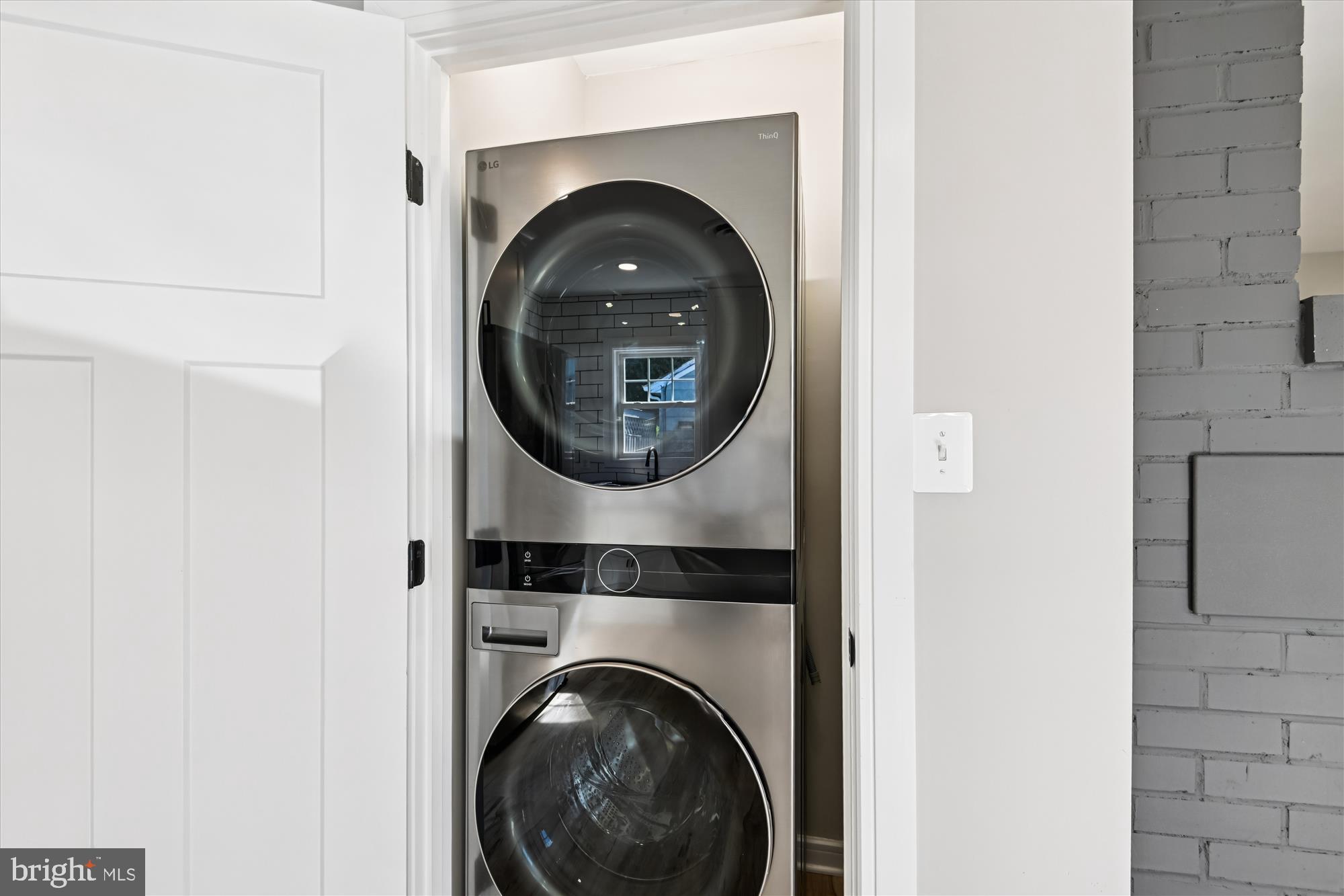 233 Farragut Road Annapolis, MD 21401 - Photo 17 of 38 Sleek laundry appliances in modern design.