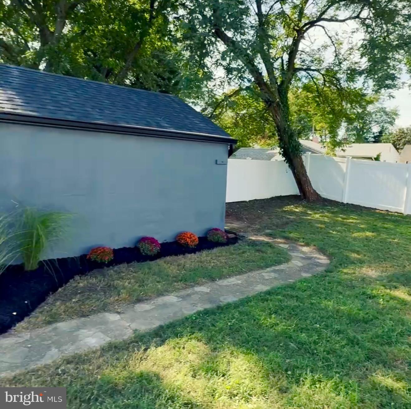 233 Farragut Road Annapolis, MD 21401 - Photo 23 of 38 Charming backyard oasis with lush greenery.