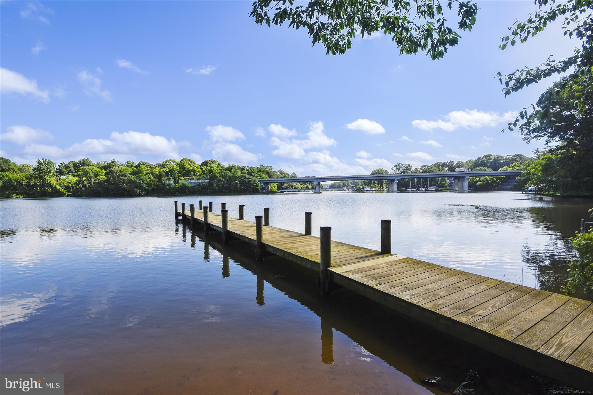 233 Farragut Road Annapolis, MD 21401 - Photo 26 of 38 Serene dock by a tranquil river.