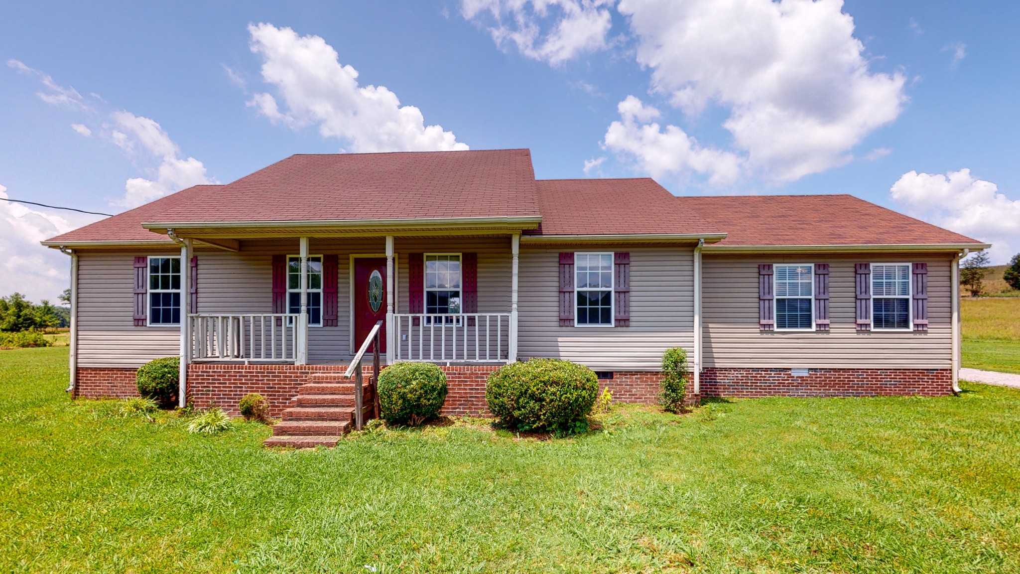 643 Beech Log Road Watertown, TN 37184 - Photo 2 of 31 a view of a house with a yard fire pit and a large tree