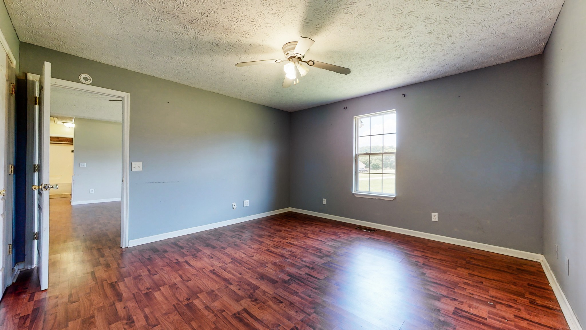 643 Beech Log Road Watertown, TN 37184 - Photo 11 of 31 wooden floor in an empty room with a window
