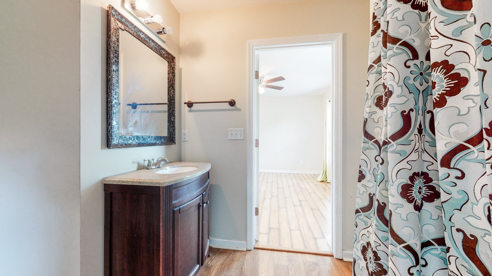 643 Beech Log Road Watertown, TN 37184 - Photo 17 of 31 a bathroom with a sink and a mirror