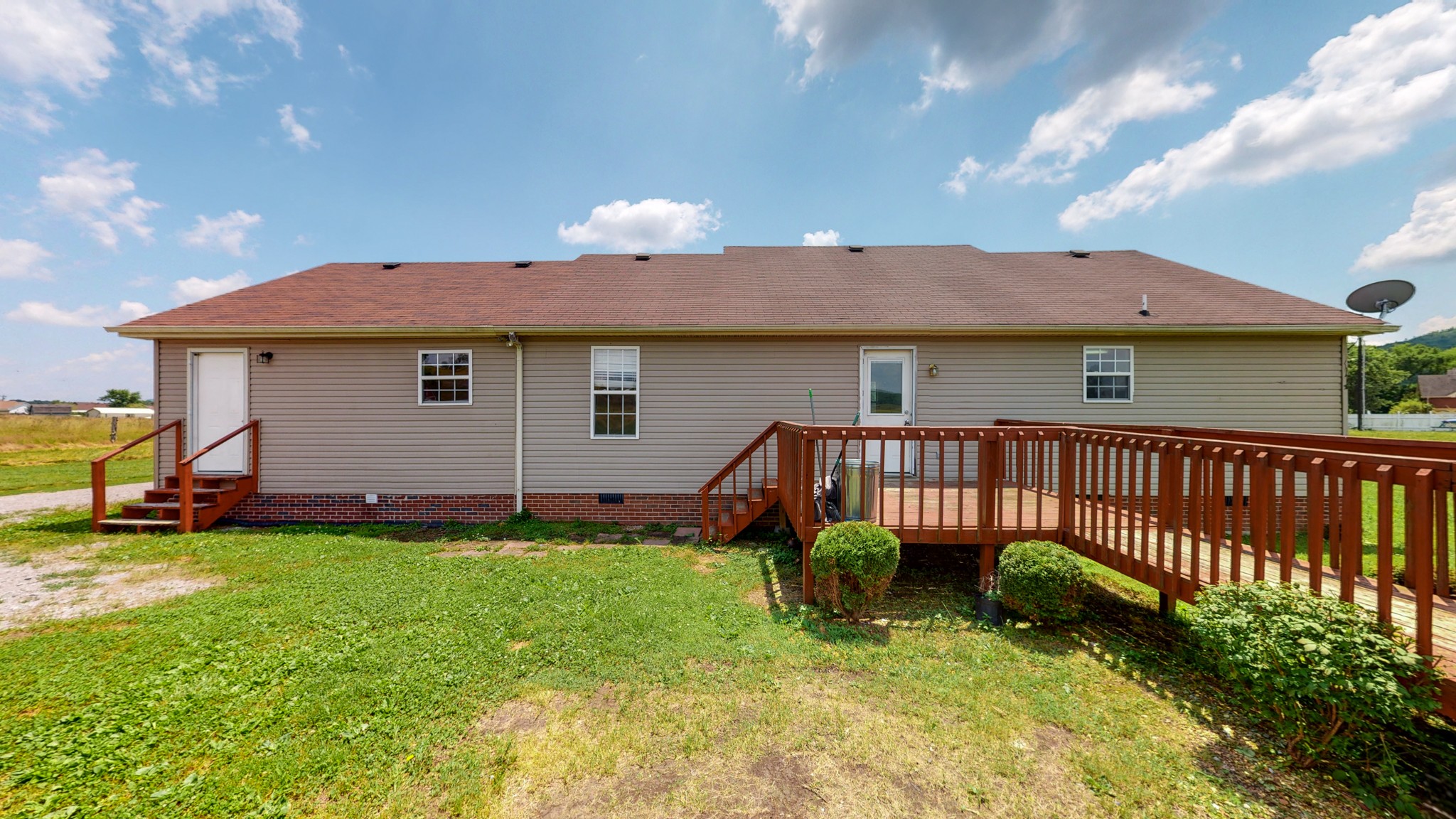643 Beech Log Road Watertown, TN 37184 - Photo 23 of 31 a view of a house with backyard and porch