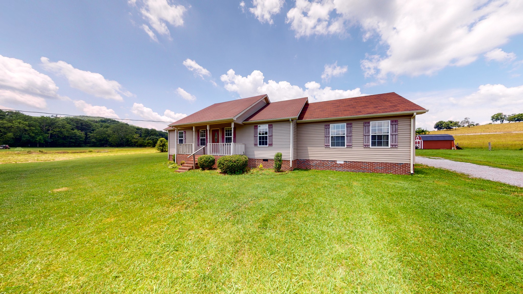 643 Beech Log Road Watertown, TN 37184 - Photo 30 of 31 a view of a house with a garden