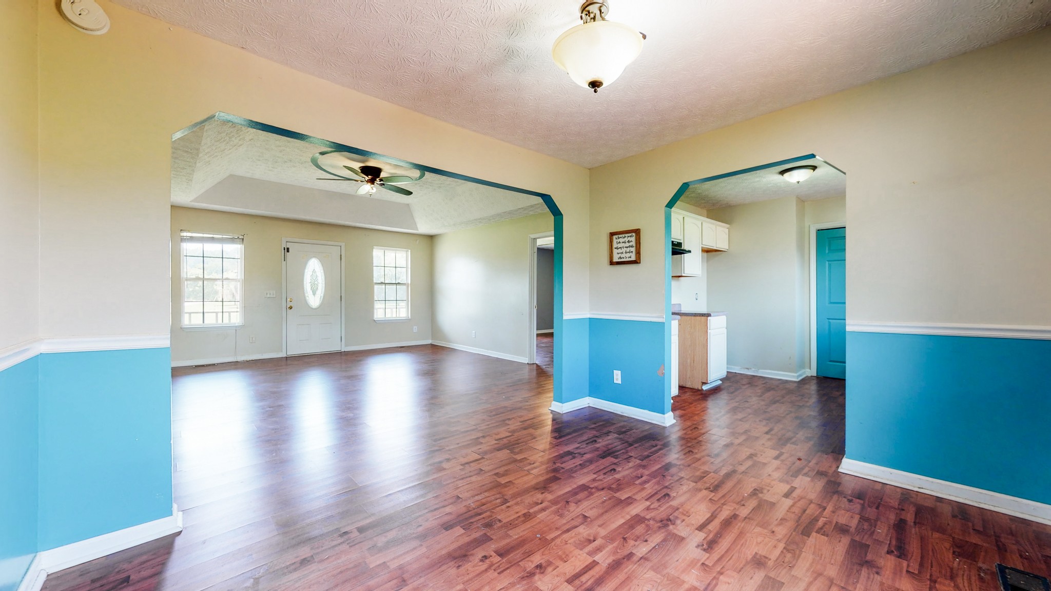 643 Beech Log Road Watertown, TN 37184 - Photo 7 of 31 a view of empty room with wooden floor and fan