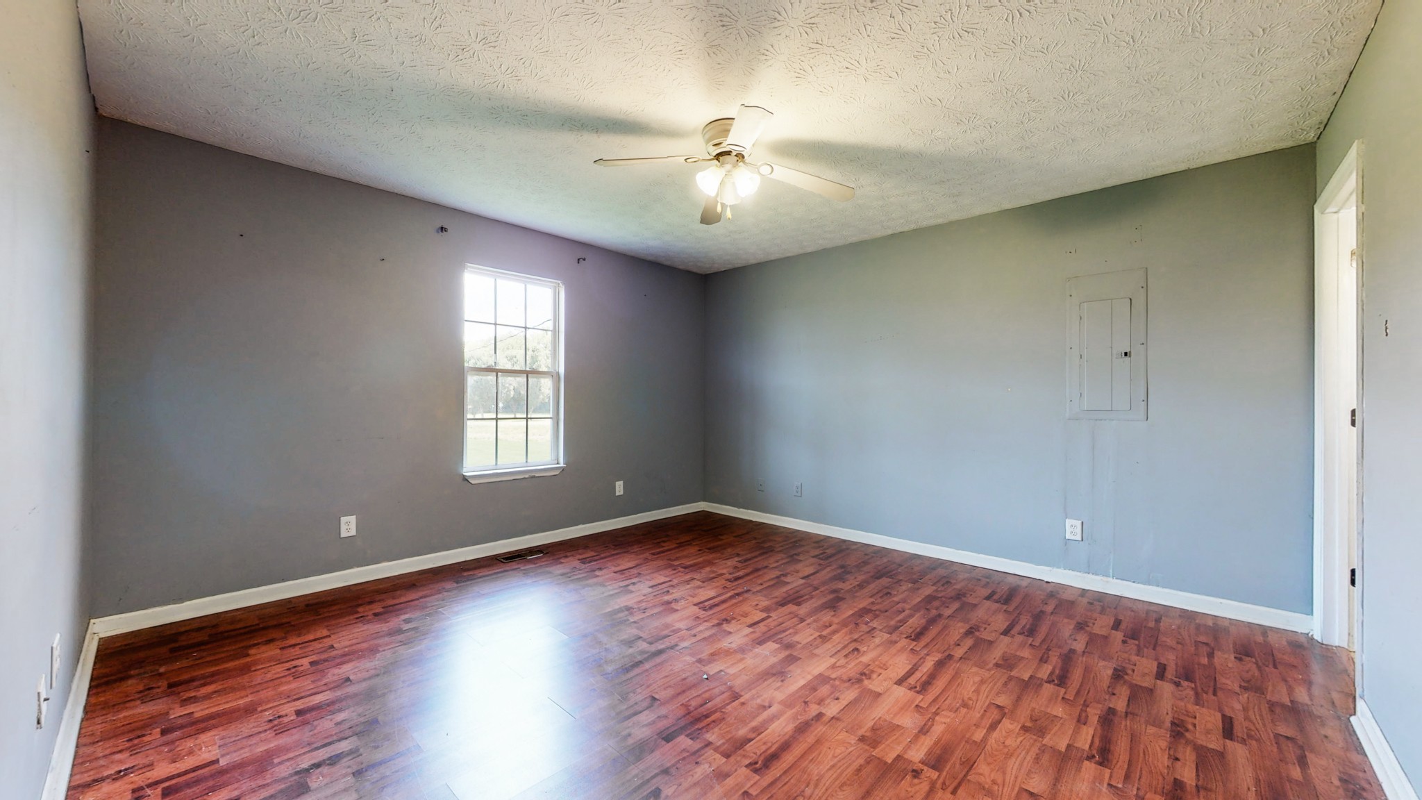 643 Beech Log Road Watertown, TN 37184 - Photo 10 of 31 wooden floor in an empty room with a window