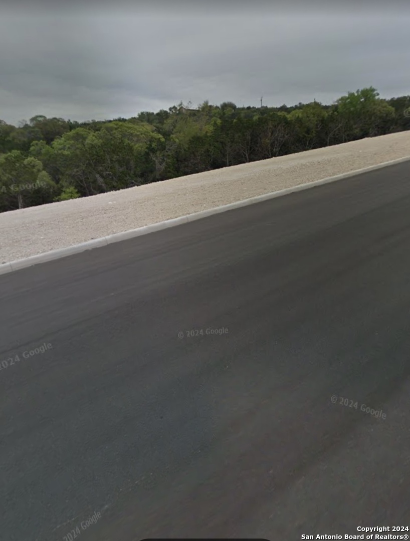 22202 Ravine San Antonio, TX 78255 - Photo 12 of 17 a view of a street