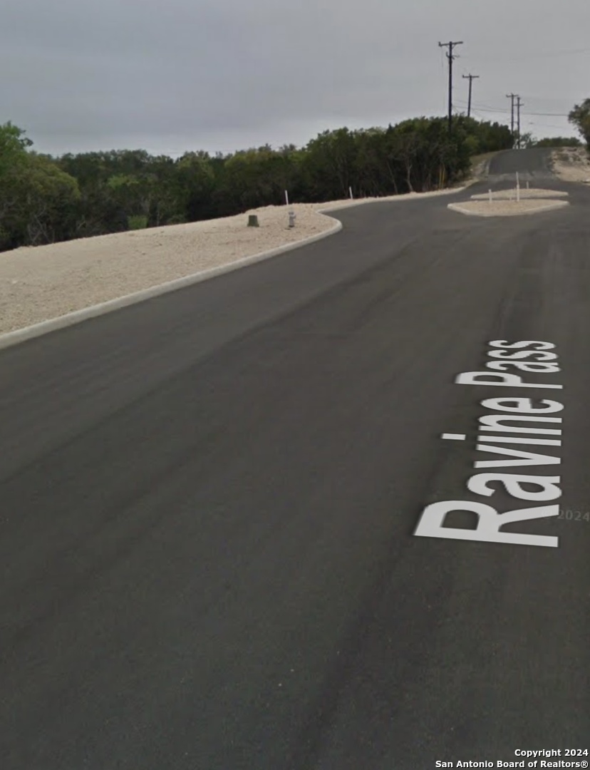 22202 Ravine San Antonio, TX 78255 - Photo 14 of 17 a view of a terrace with sky view