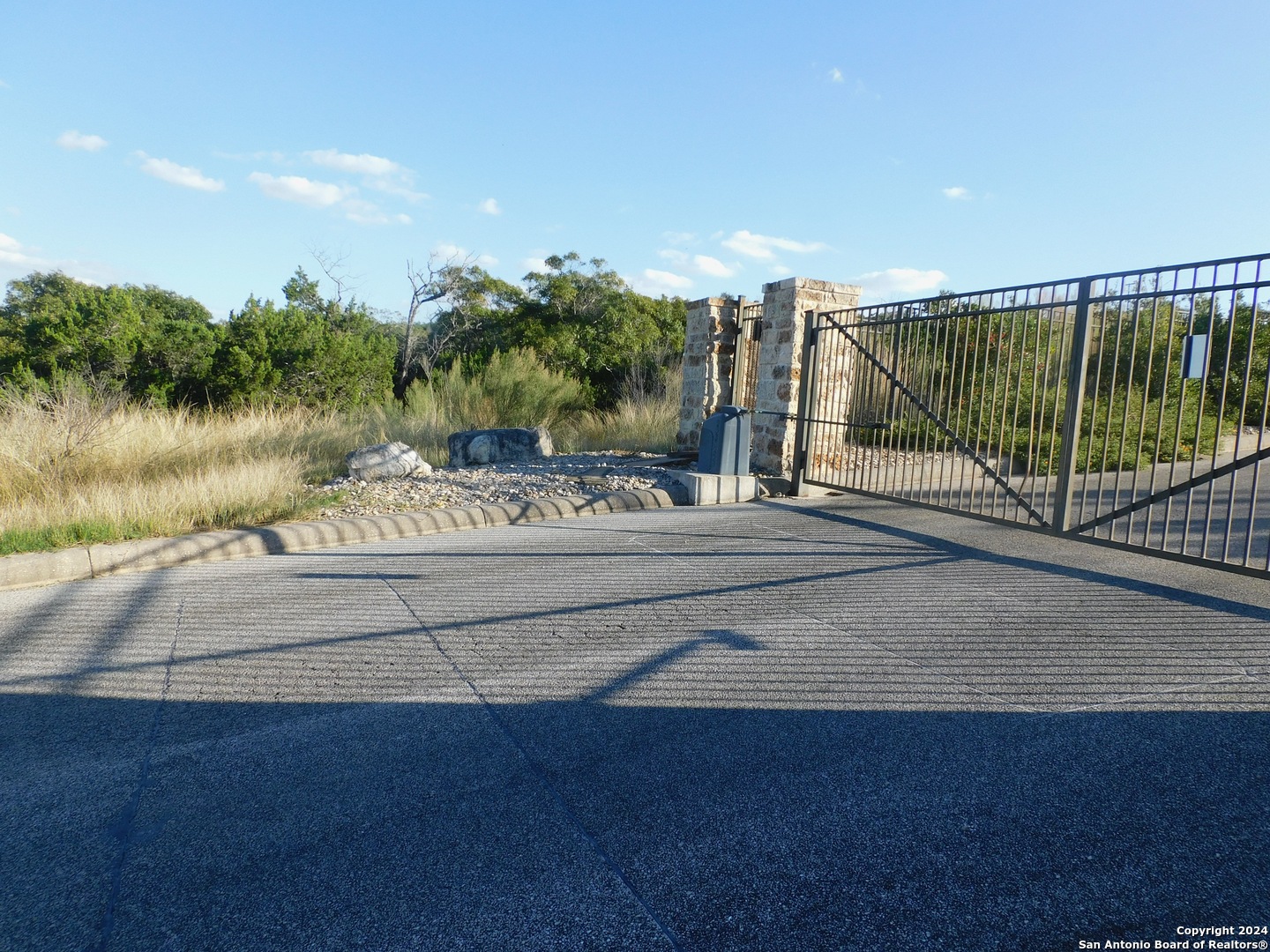 22202 Ravine San Antonio, TX 78255 - Photo 15 of 17 a view of a wrought iron fences