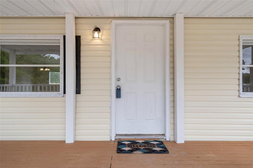 18008 Greensboro Street Spring Hill, FL 34610 - Photo 12 of 49 a view of a door and a window