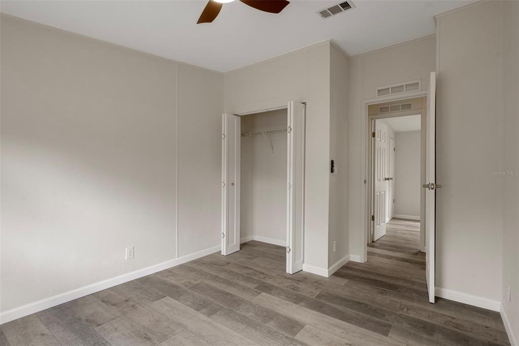 18008 Greensboro Street Spring Hill, FL 34610 - Photo 39 of 49 wooden floor in an empty room