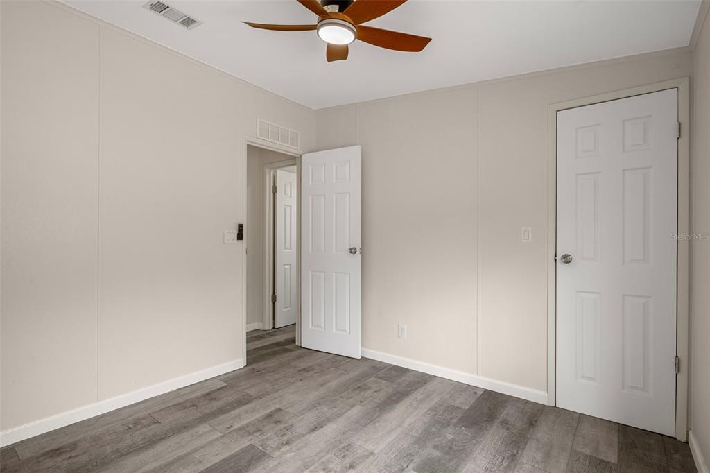 18008 Greensboro Street Spring Hill, FL 34610 - Photo 42 of 49 wooden floor in an empty room