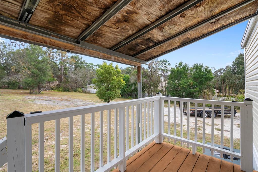 18008 Greensboro Street Spring Hill, FL 34610 - Photo 45 of 49 a view of balcony with wooden floor
