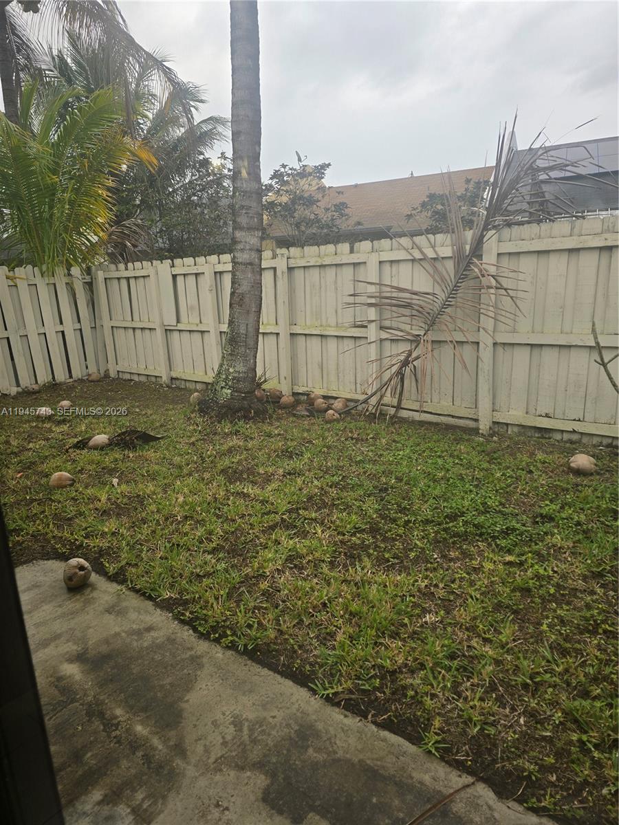 1322 Sandpiper Boulevard, Unit 1 Homestead, FL 33034 - Photo 21 of 25 a view of a backyard