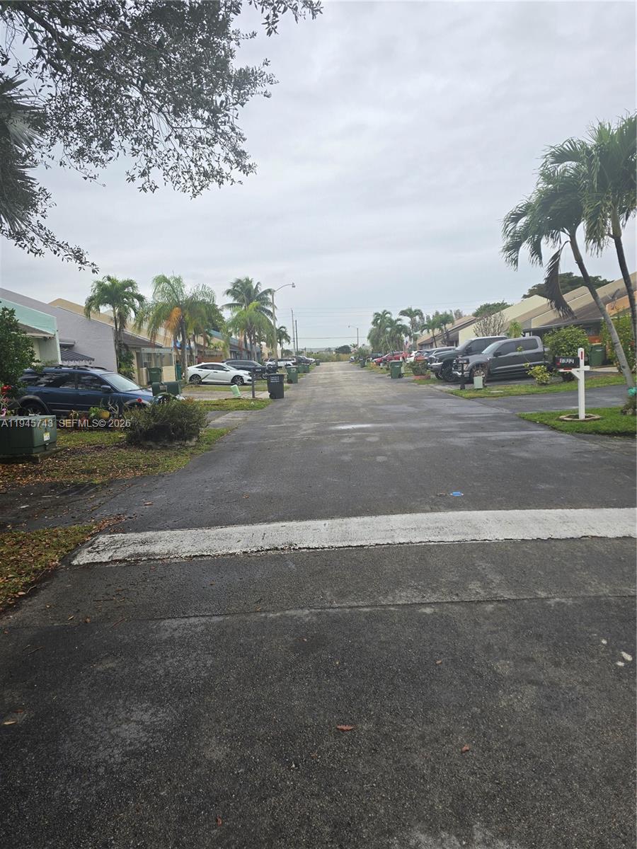 1322 Sandpiper Boulevard, Unit 1 Homestead, FL 33034 - Photo 3 of 25 a view of a town with big trees
