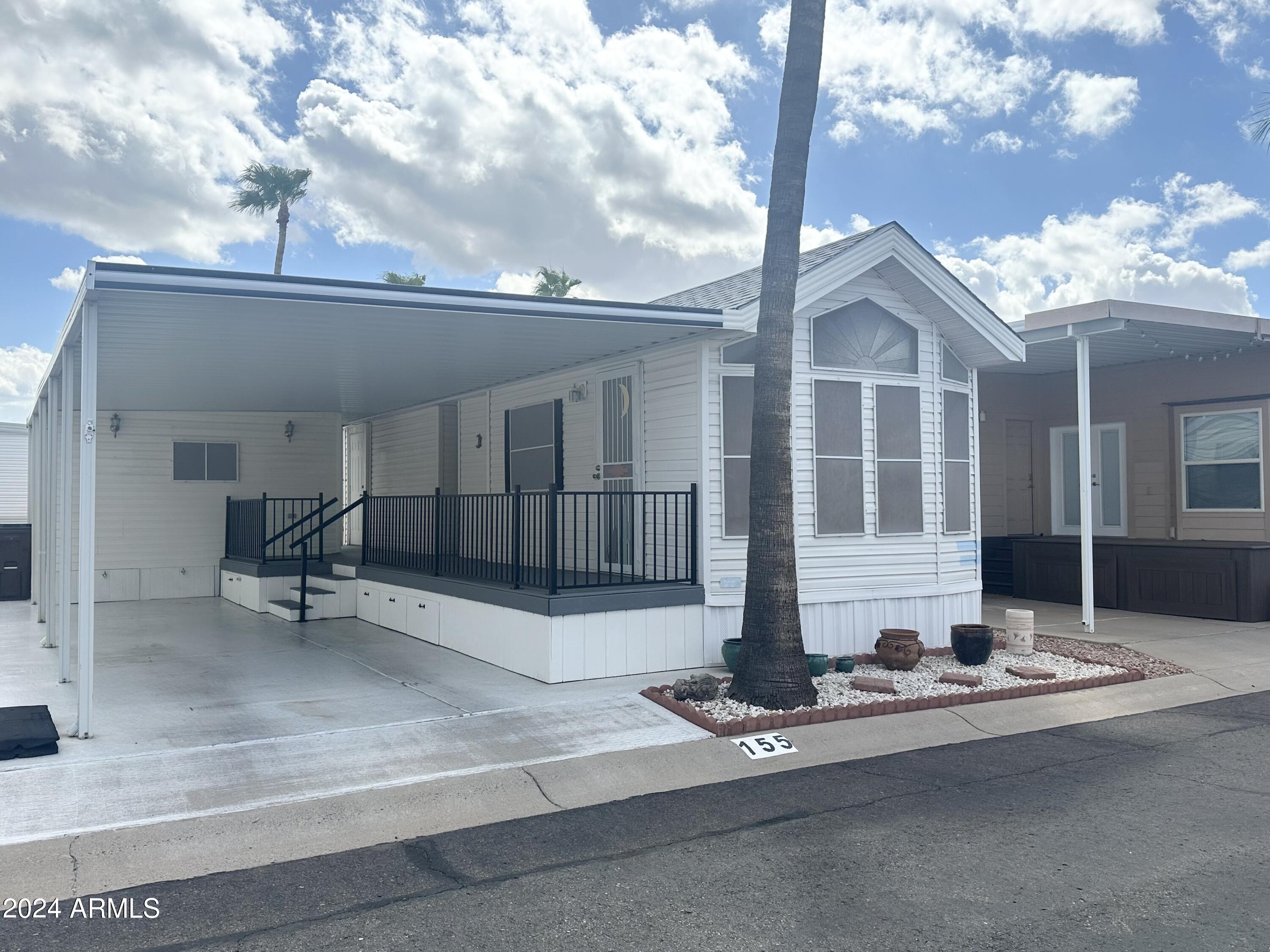 a outdoor space with lots of white furniture