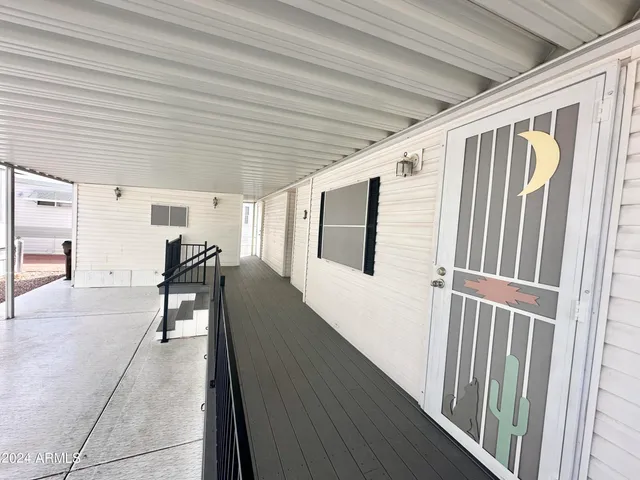a view of a hallway with chairs