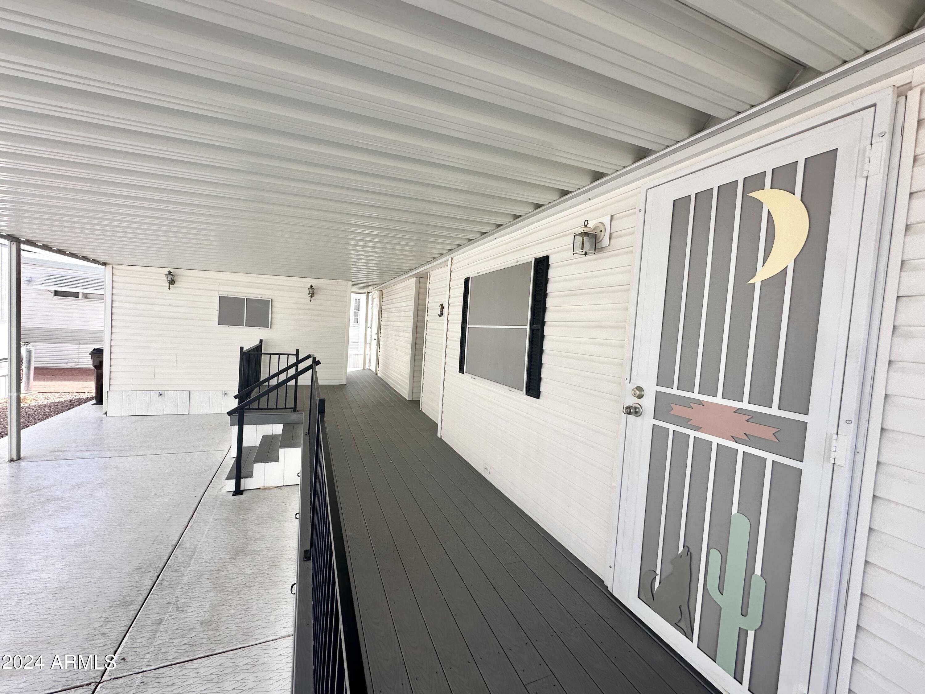 155 South Limestone Drive Apache Junction, AZ 85119 - Photo 10 of 47 a view of a hallway with chairs