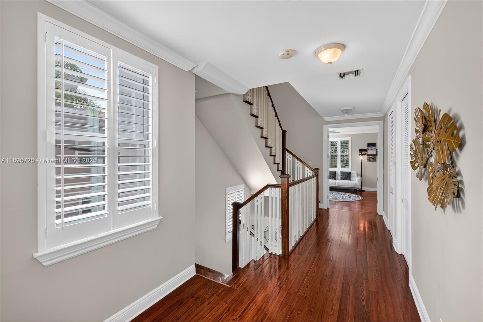 312 Northeast 12th Avenue Fort Lauderdale, FL 33301 - Photo 12 of 39 a view of entryway with wooden floor and stairs