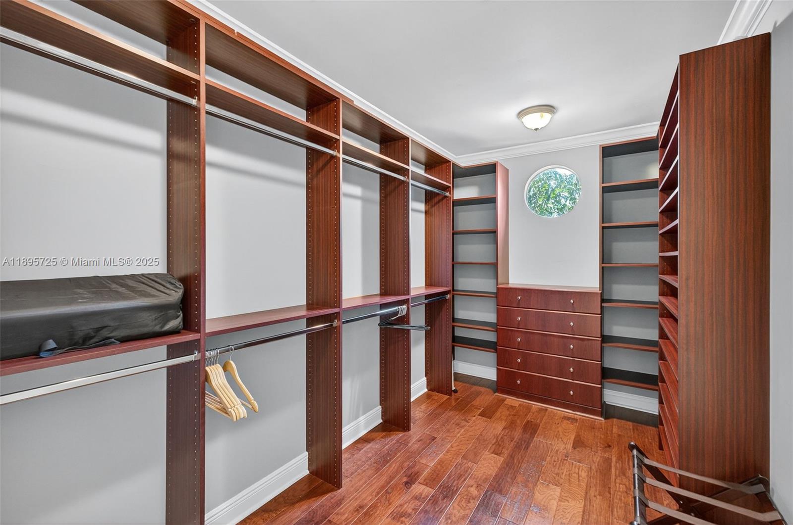 312 Northeast 12th Avenue Fort Lauderdale, FL 33301 - Photo 17 of 39 a view of walk in closet with empty racks