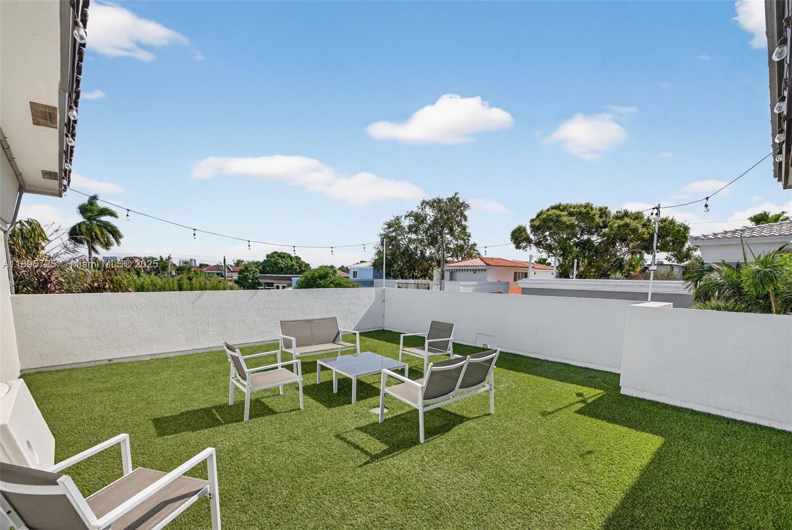 312 Northeast 12th Avenue Fort Lauderdale, FL 33301 - Photo 27 of 39 a view of an chairs and tables in the patio
