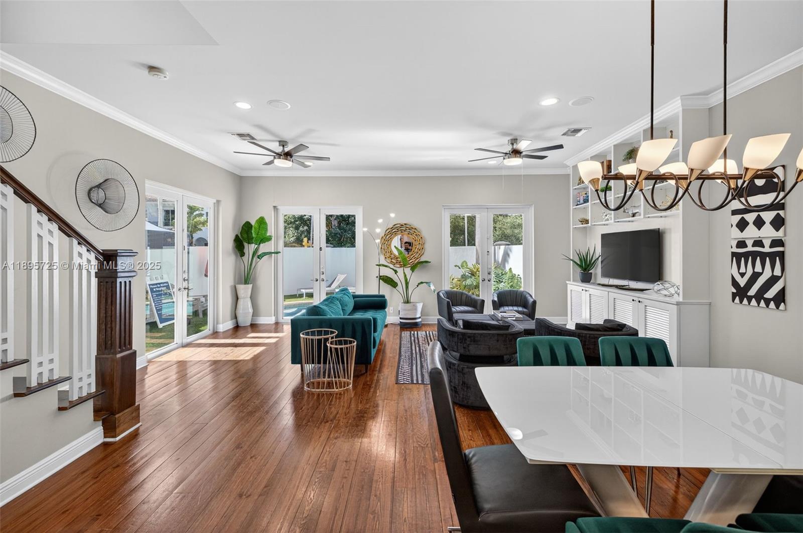 312 Northeast 12th Avenue Fort Lauderdale, FL 33301 - Photo 9 of 39 a view of a dining room with furniture and wooden floor