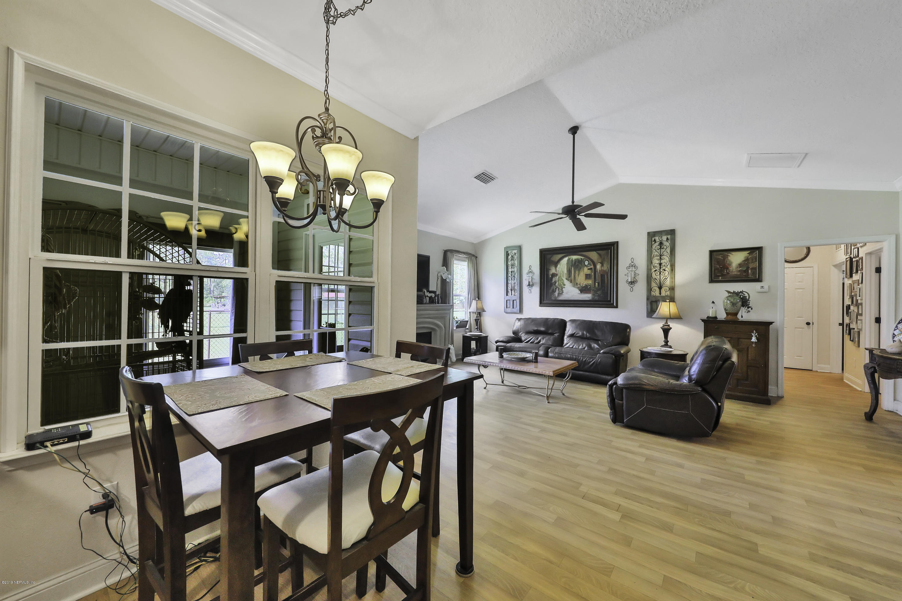 1405 Roberts Road St. Johns, FL 32259 - Photo 12 of 27 a view of a dining room with furniture window and wooden floor