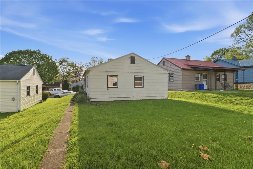 1417 Randolph Street New Castle, PA 16101 - Photo 13 of 15 a front view of house with yard and green space