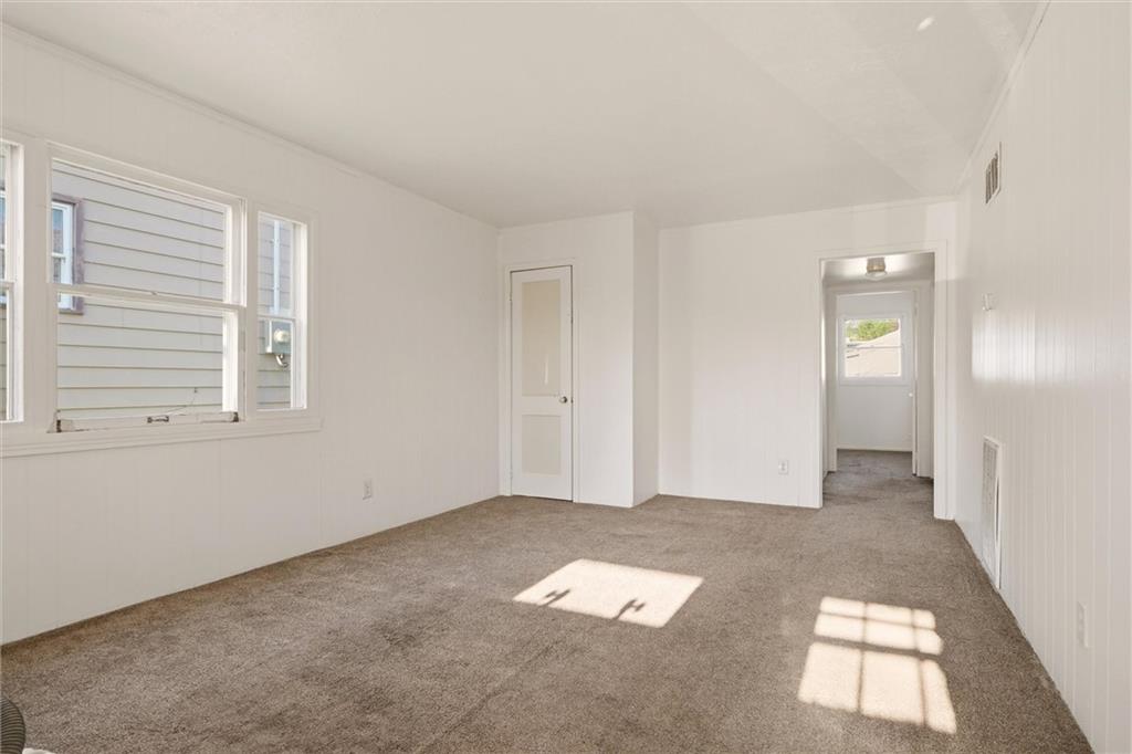 1417 Randolph Street New Castle, PA 16101 - Photo 4 of 15 an empty room with windows
