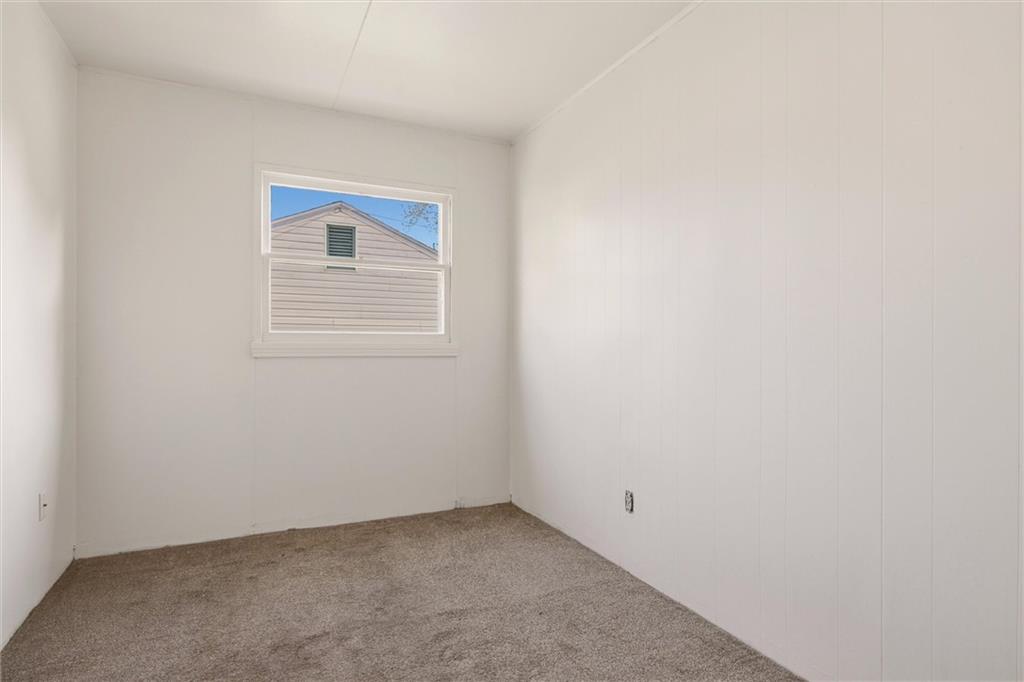 1417 Randolph Street New Castle, PA 16101 - Photo 5 of 15 an empty room with a window