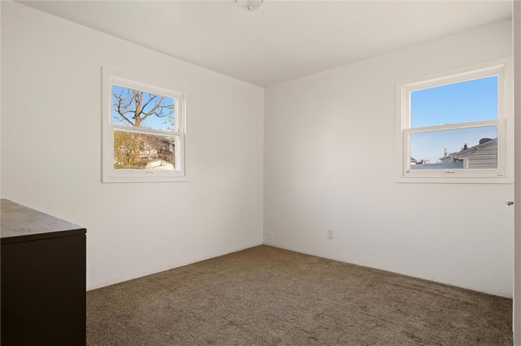 1417 Randolph Street New Castle, PA 16101 - Photo 6 of 15 an empty room with windows