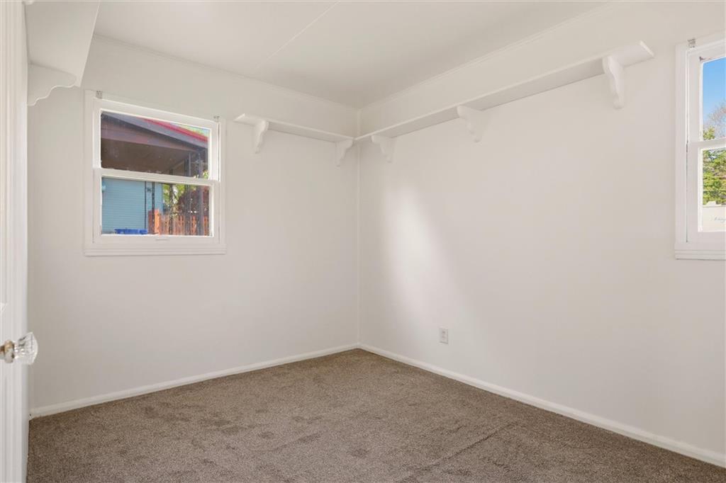 1417 Randolph Street New Castle, PA 16101 - Photo 7 of 15 an empty room with a window