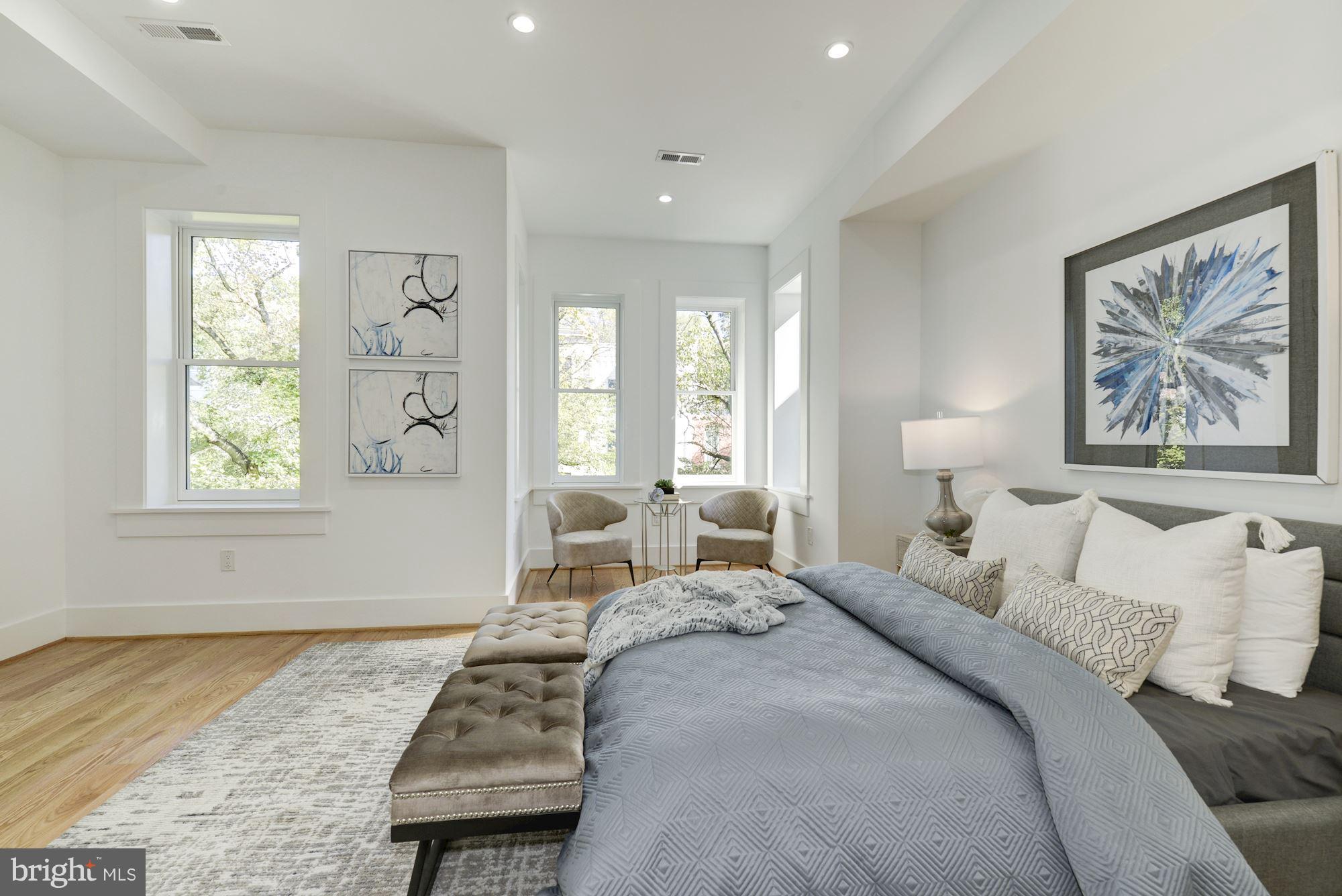 17 7th Street Southeast Washington, DC 20003 - Photo 19 of 29 a bedroom with a bed and a window