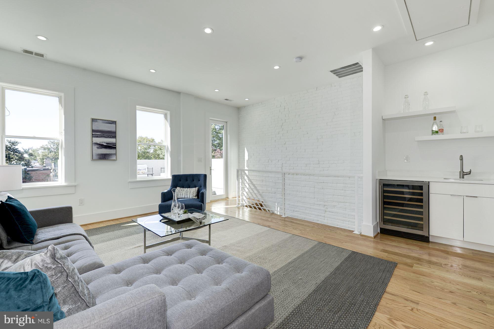 17 7th Street Southeast Washington, DC 20003 - Photo 23 of 29 a living room with furniture