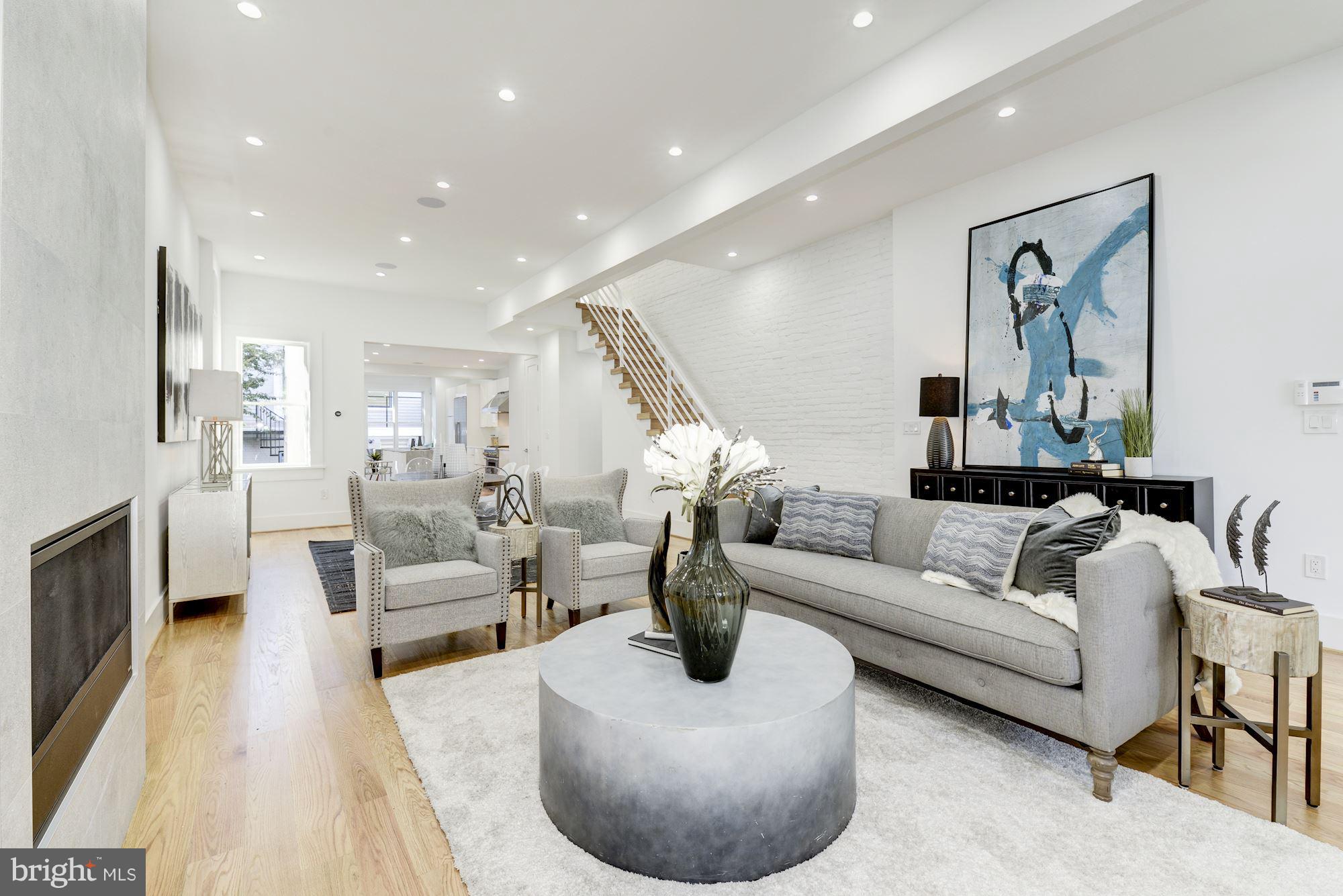 17 7th Street Southeast Washington, DC 20003 - Photo 4 of 29 a living room with furniture and a wooden floor