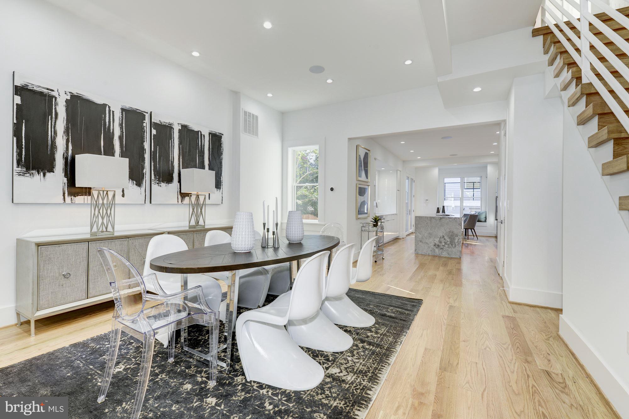 17 7th Street Southeast Washington, DC 20003 - Photo 6 of 29 a dining room with furniture and wooden floor