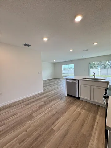 a view of a kitchen and a sink