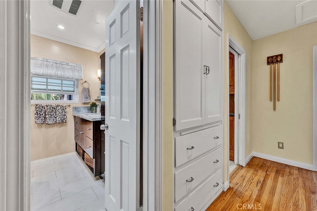 5456 Cadbury Road Whittier, CA 90601 - Photo 15 of 67 a view of kitchen with furniture and wooden floor