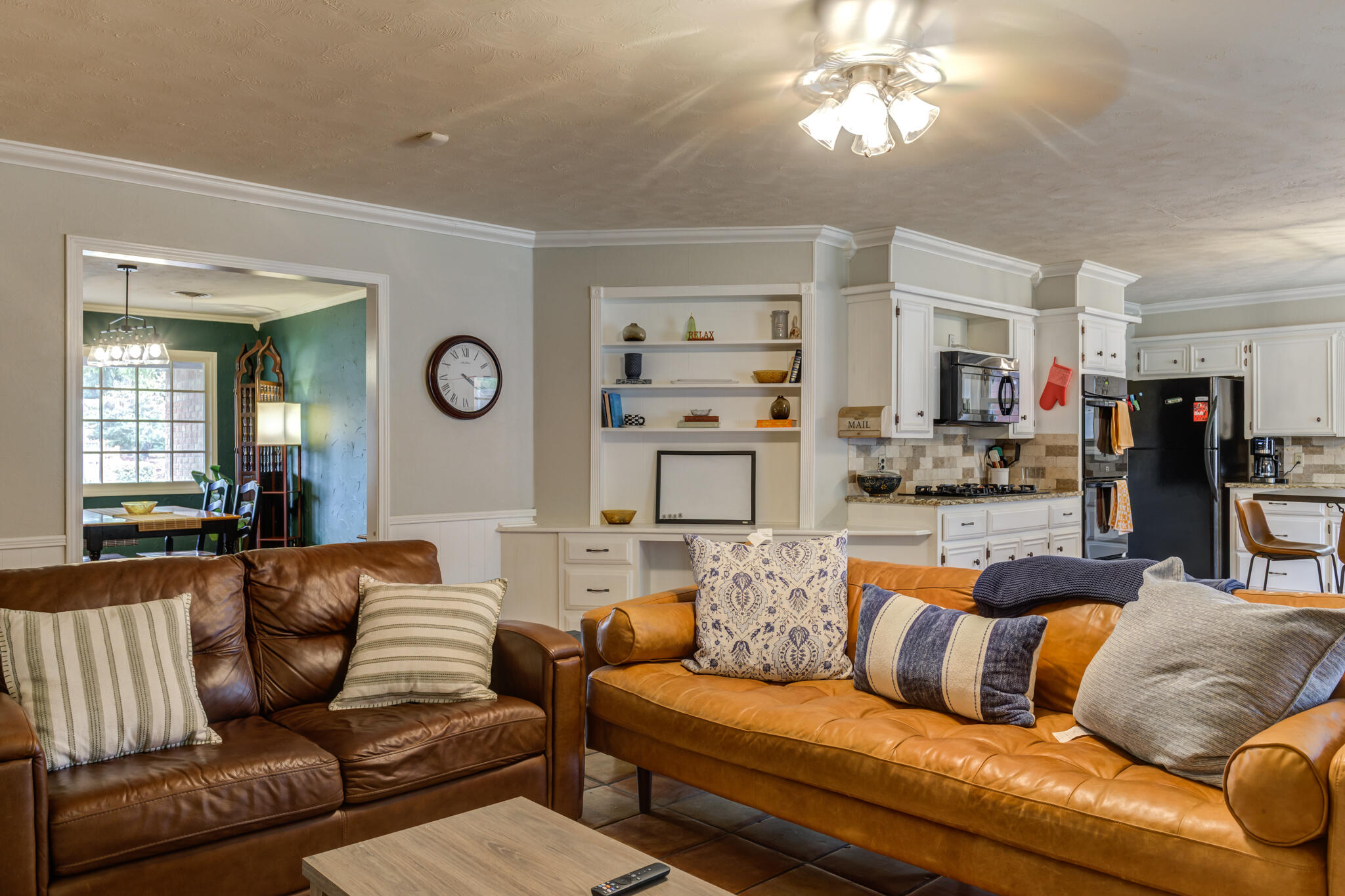 3420 60th Street Lubbock, TX 79413 - Photo 18 of 57 a view of living room kitchen with furniture and wooden floor