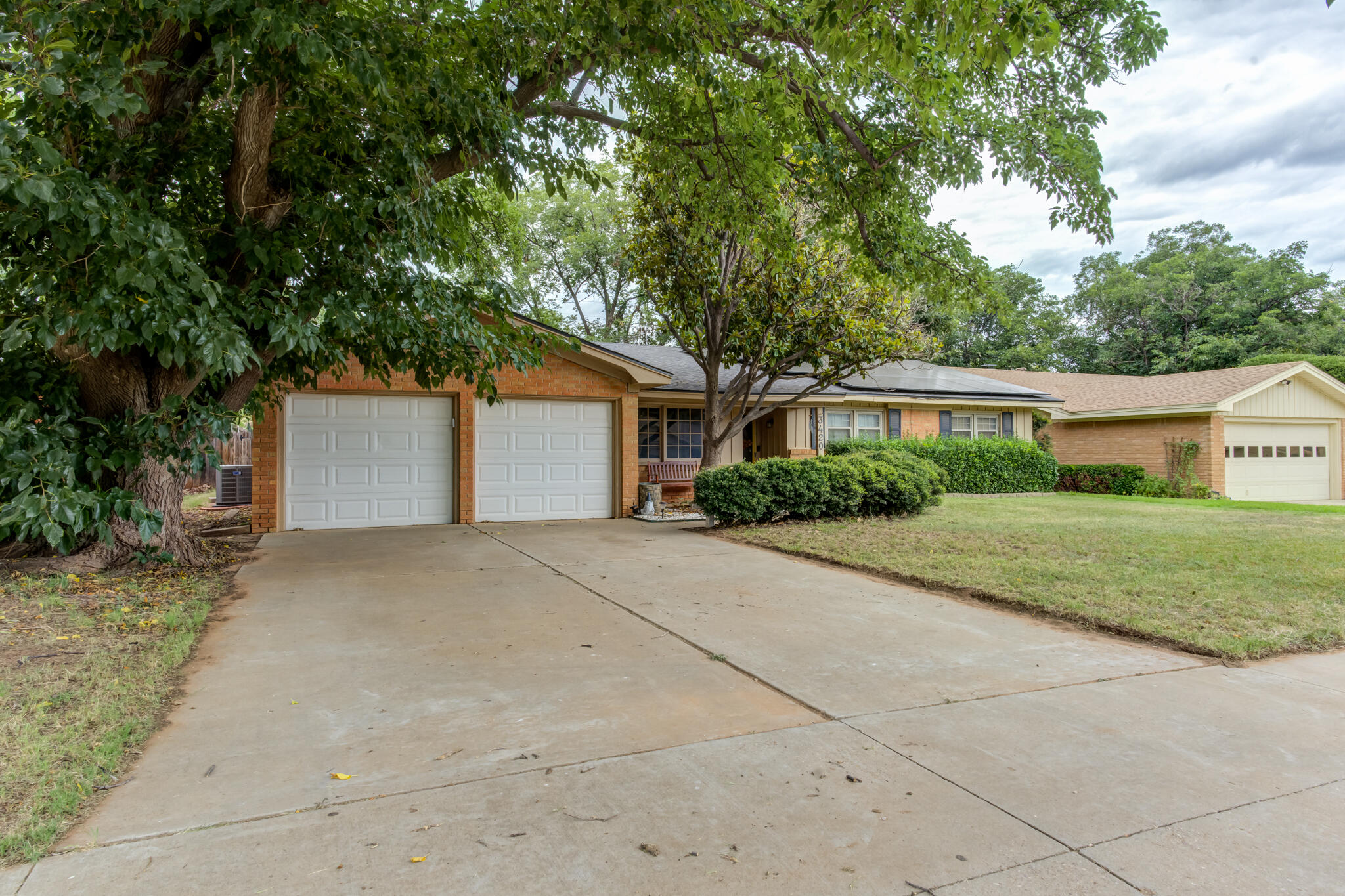 3420 60th Street Lubbock, TX 79413 - Photo 3 of 57 a house view with a outdoor space