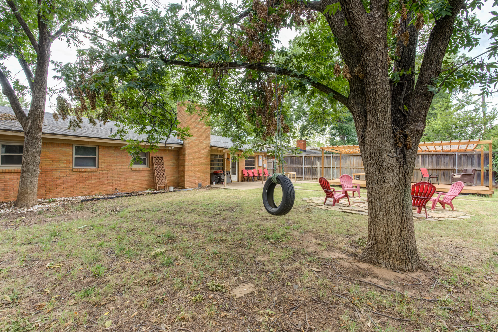 3420 60th Street Lubbock, TX 79413 - Photo 56 of 57 a view of a house with a backyard