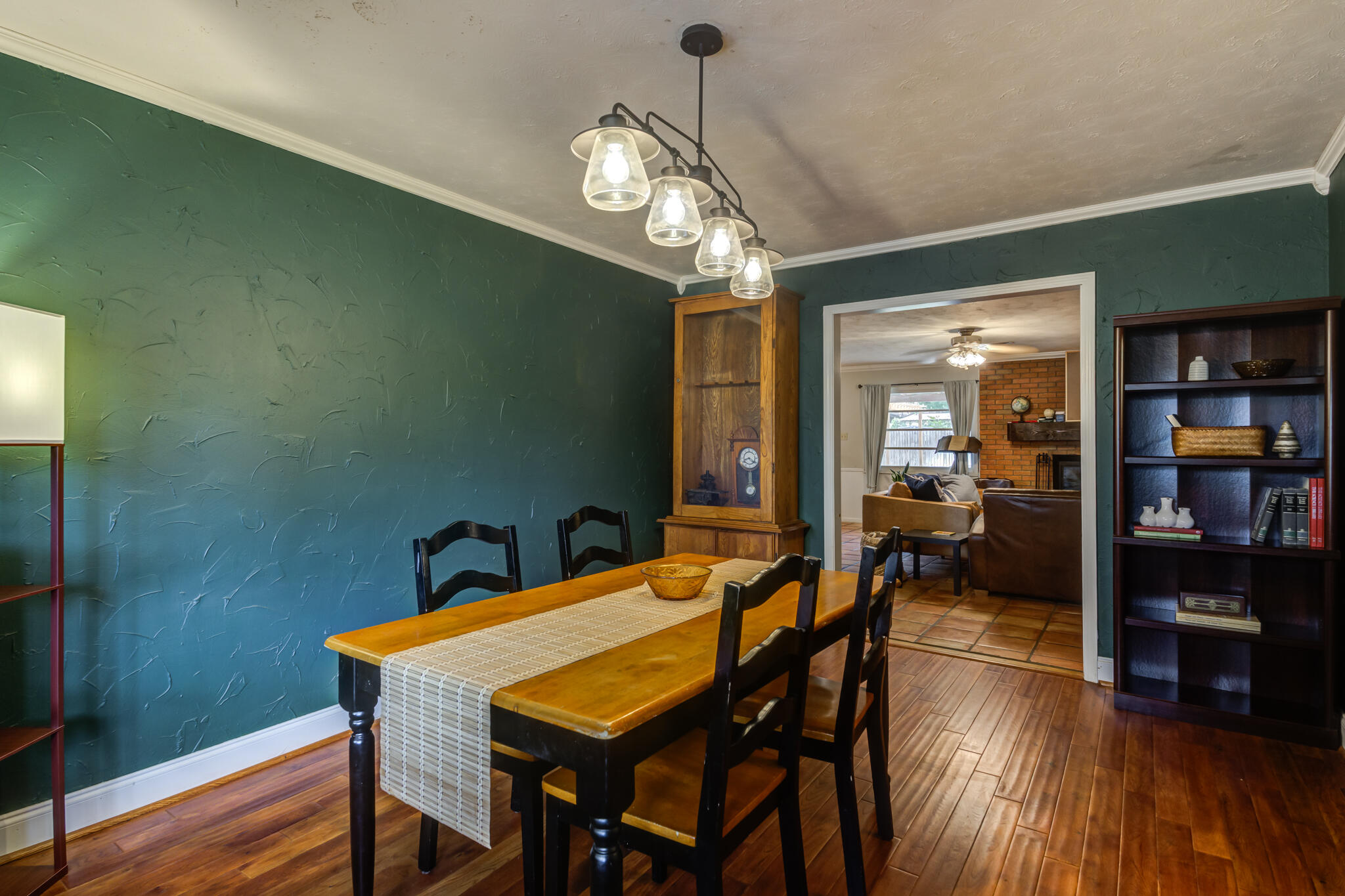 3420 60th Street Lubbock, TX 79413 - Photo 10 of 57 a dining room with furniture and wooden floor