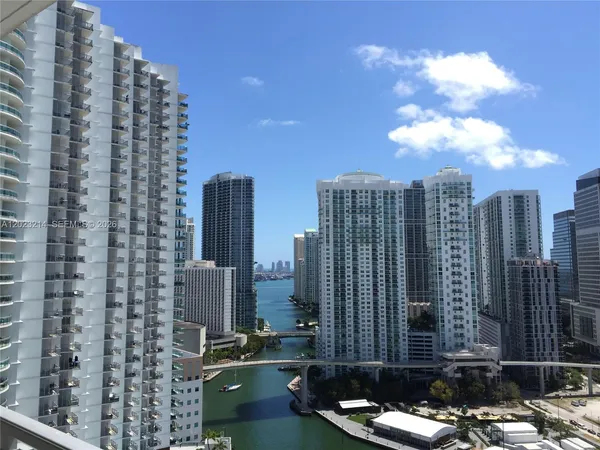 a view of a city with tall buildings
