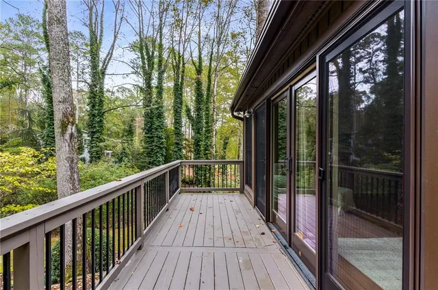 a room with furniture and a large window